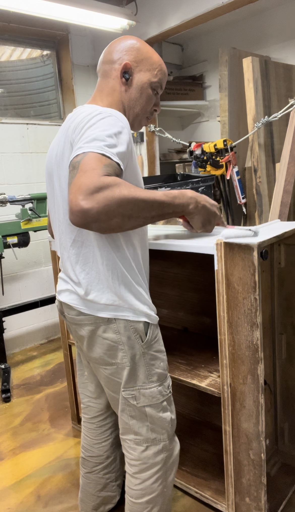 Michael Mauricio (Founder) working on epoxy bar